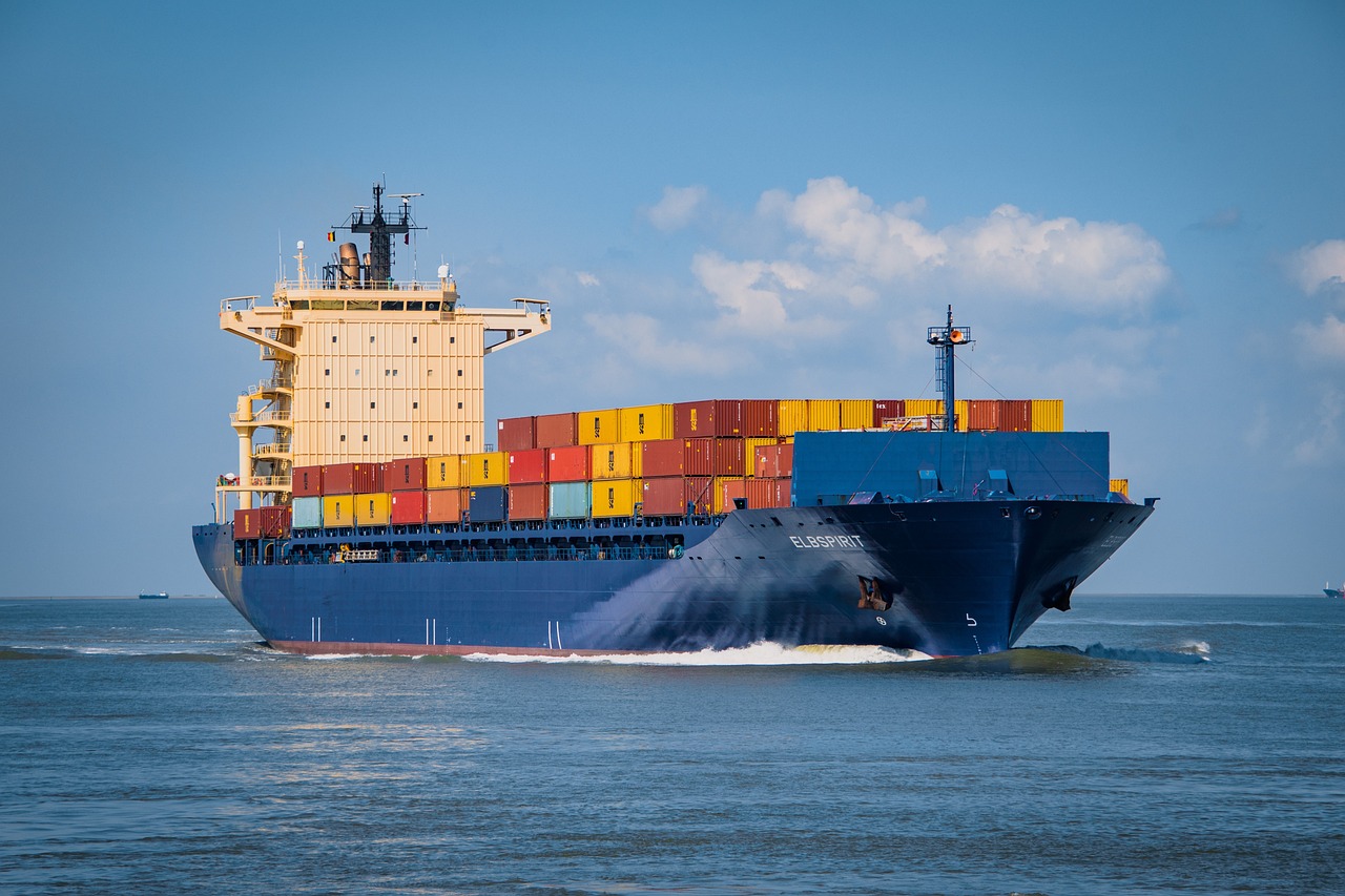 An image of goods being securely loaded onto a transport vehicle, symbolizing comprehensive transportation insurance coverage.